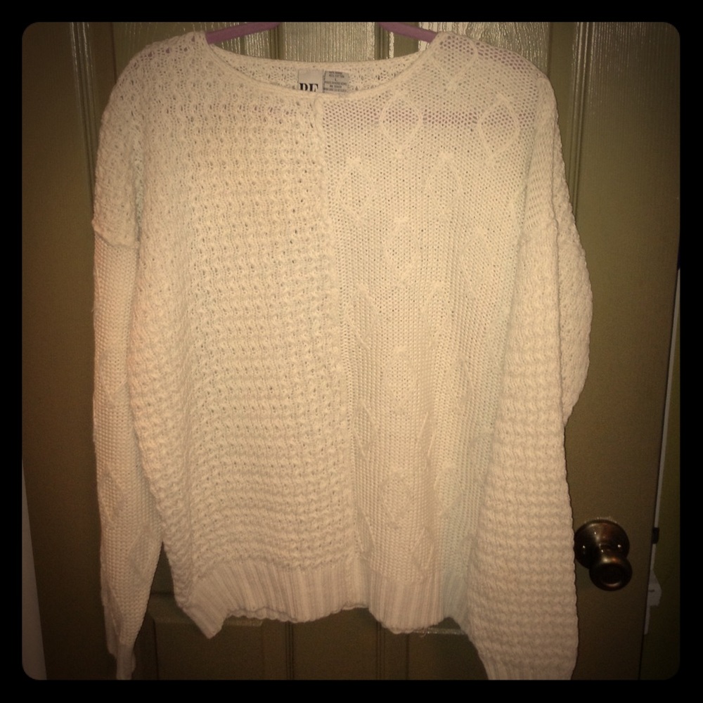 Vintage cream colored cable knit sweater.
