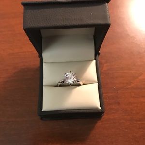 2 kt round cut solitaire engagement or travel ring