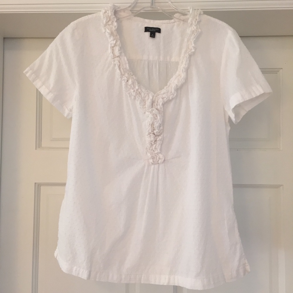 Cute white polka dot and ruffle shortsleeve blouse