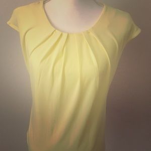 Anna Taylor yellow sleeveless blouse