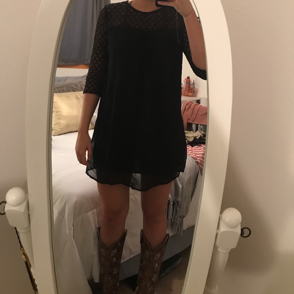 black dress with lace detail.
