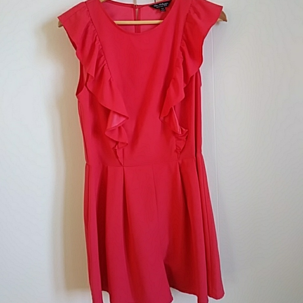 Stylish romper. Coral color.
