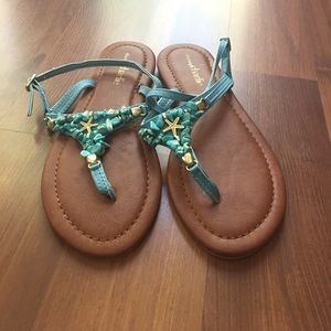 Size 6 shell sandals!