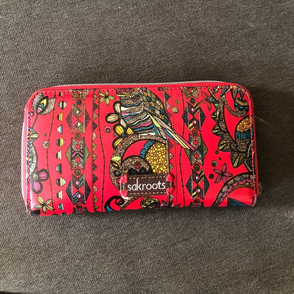 Unique and adorable Sakroots wallet!
