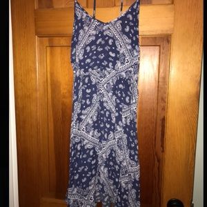 A long blue and white detailed summer dress