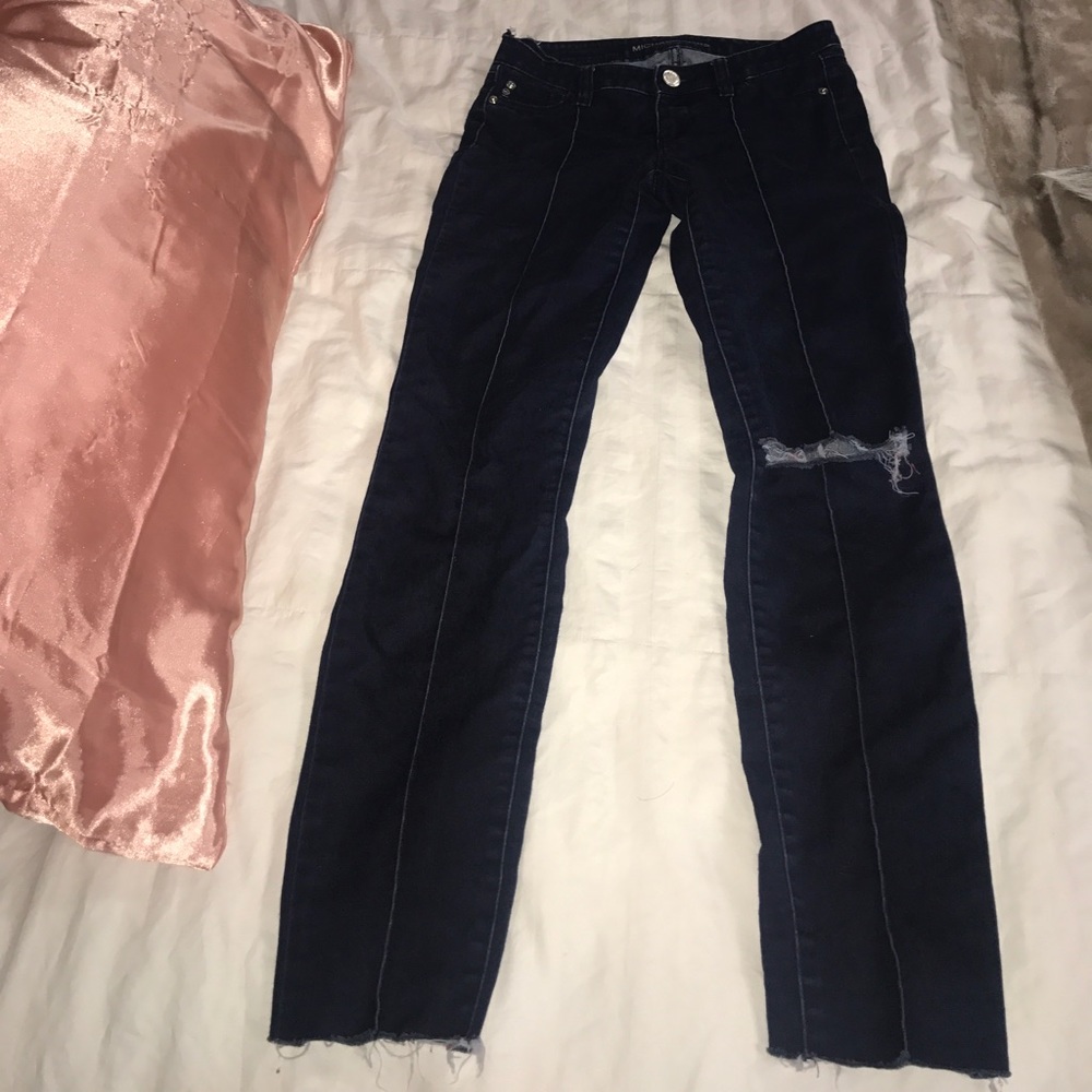 Michael Kors jeans with a knee rip