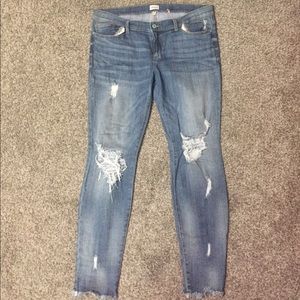 Distressed low rise skinny’s