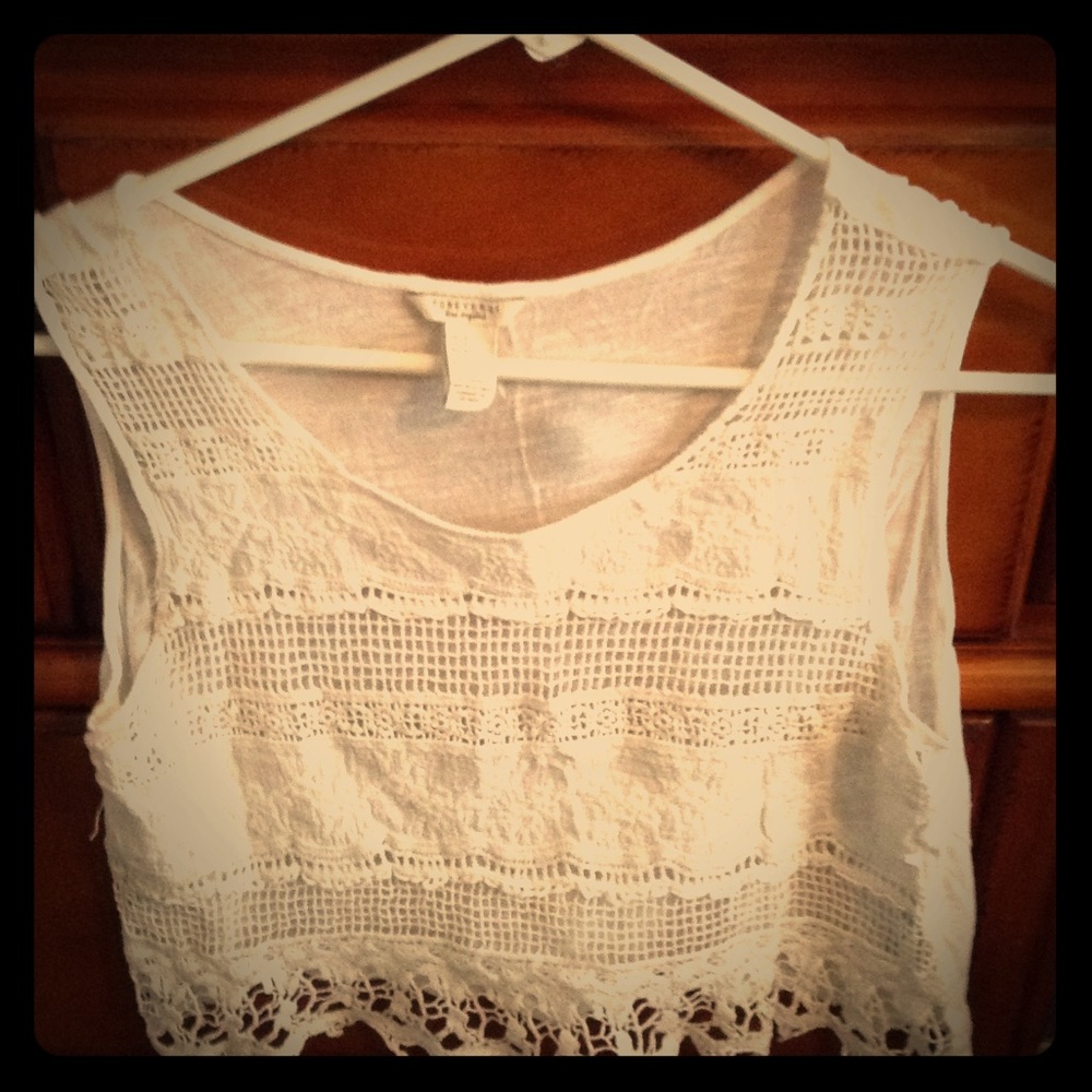 Sleeveless white blouse