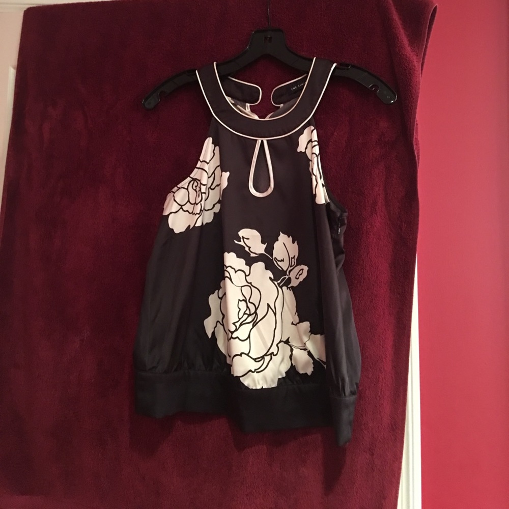 Black with white flower print shirt