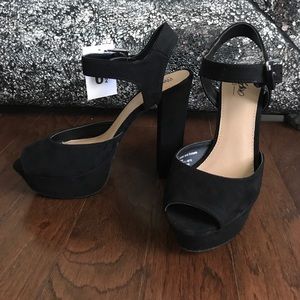 Brand new never worn peep toe heels