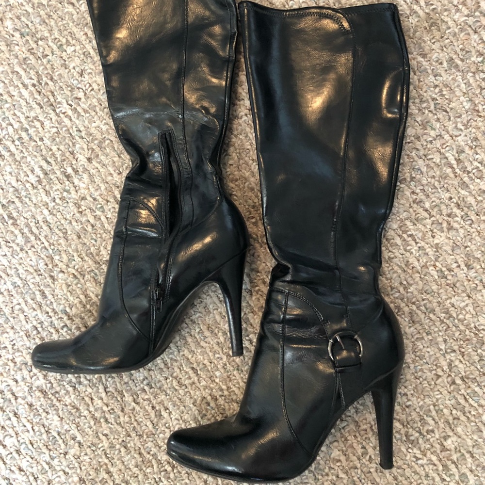 Tall black boots.
