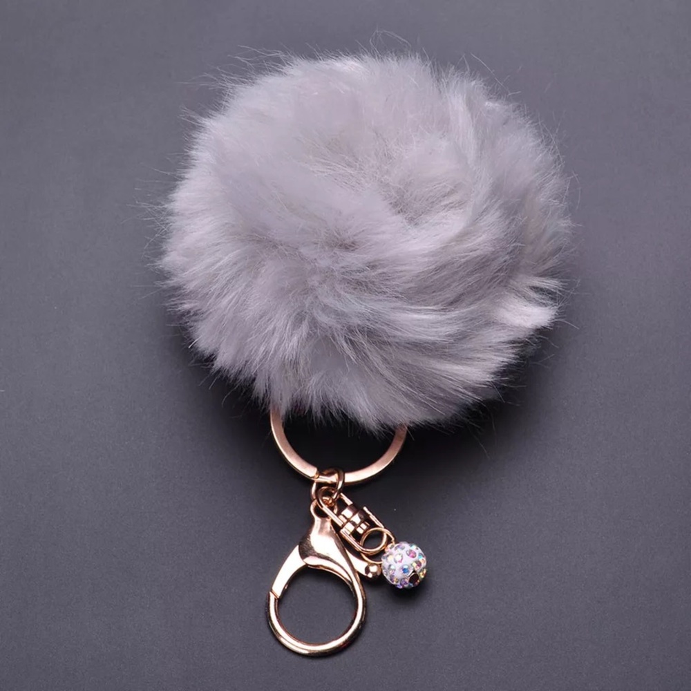 NWT FUN Trendy POM POM with Sparkle Charm‼️👜📱