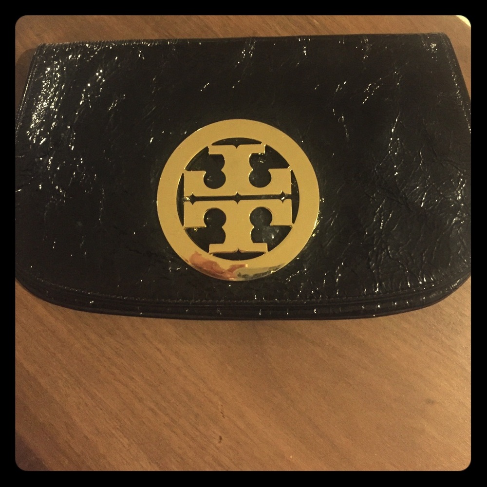 Authentic Tory Burch clutch with gold hardware.