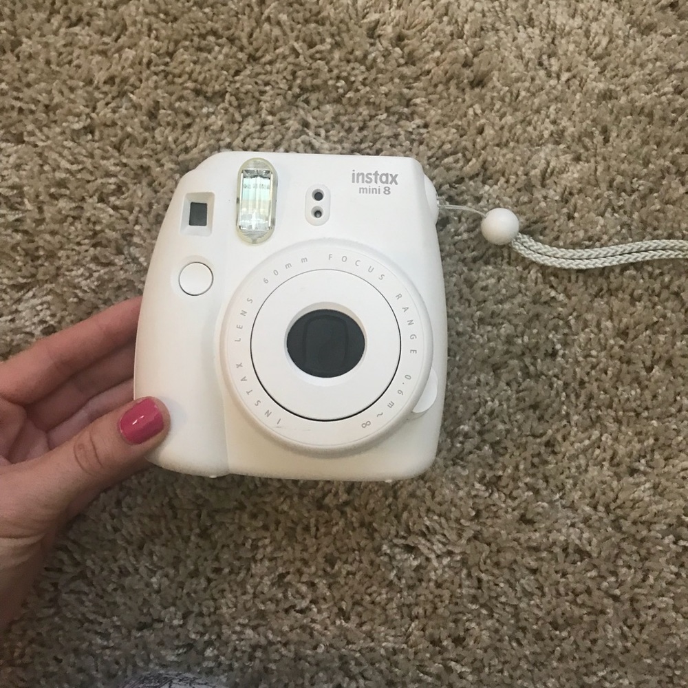 White Polaroid Camera. NOTE- does not work