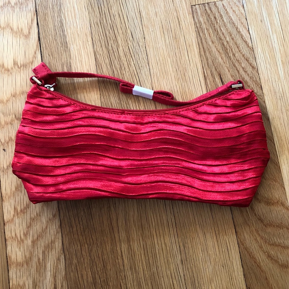 Red wristlet.