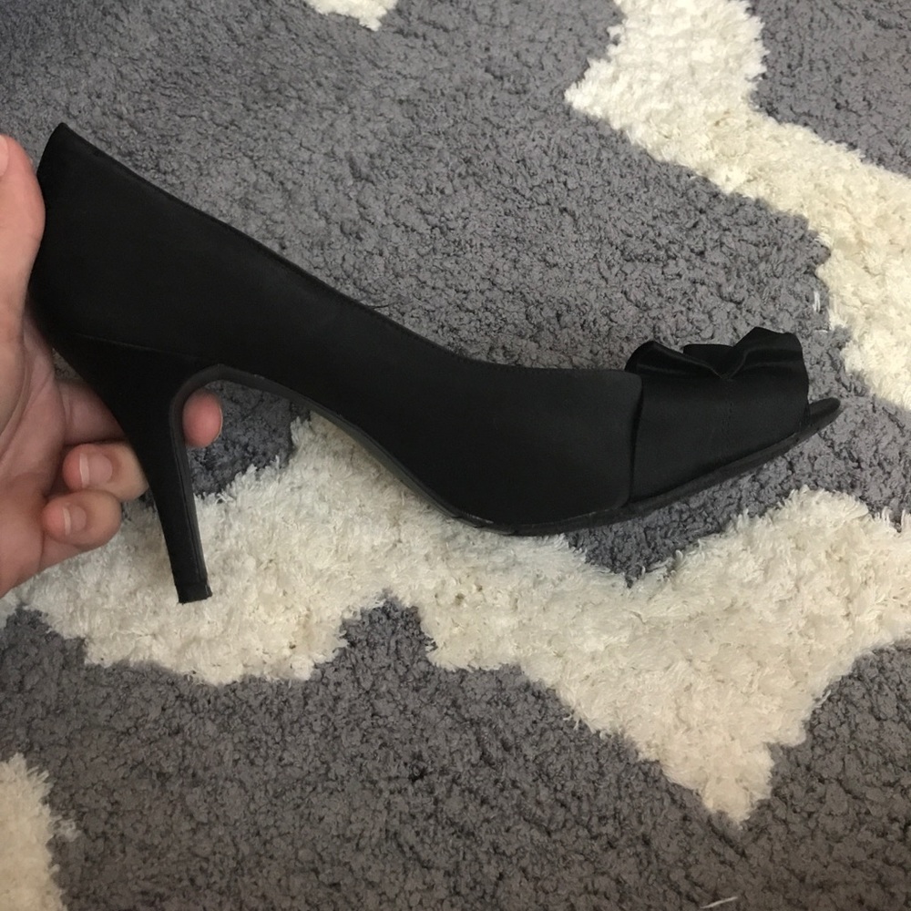 Black satin peep toe heels with ruffle detail