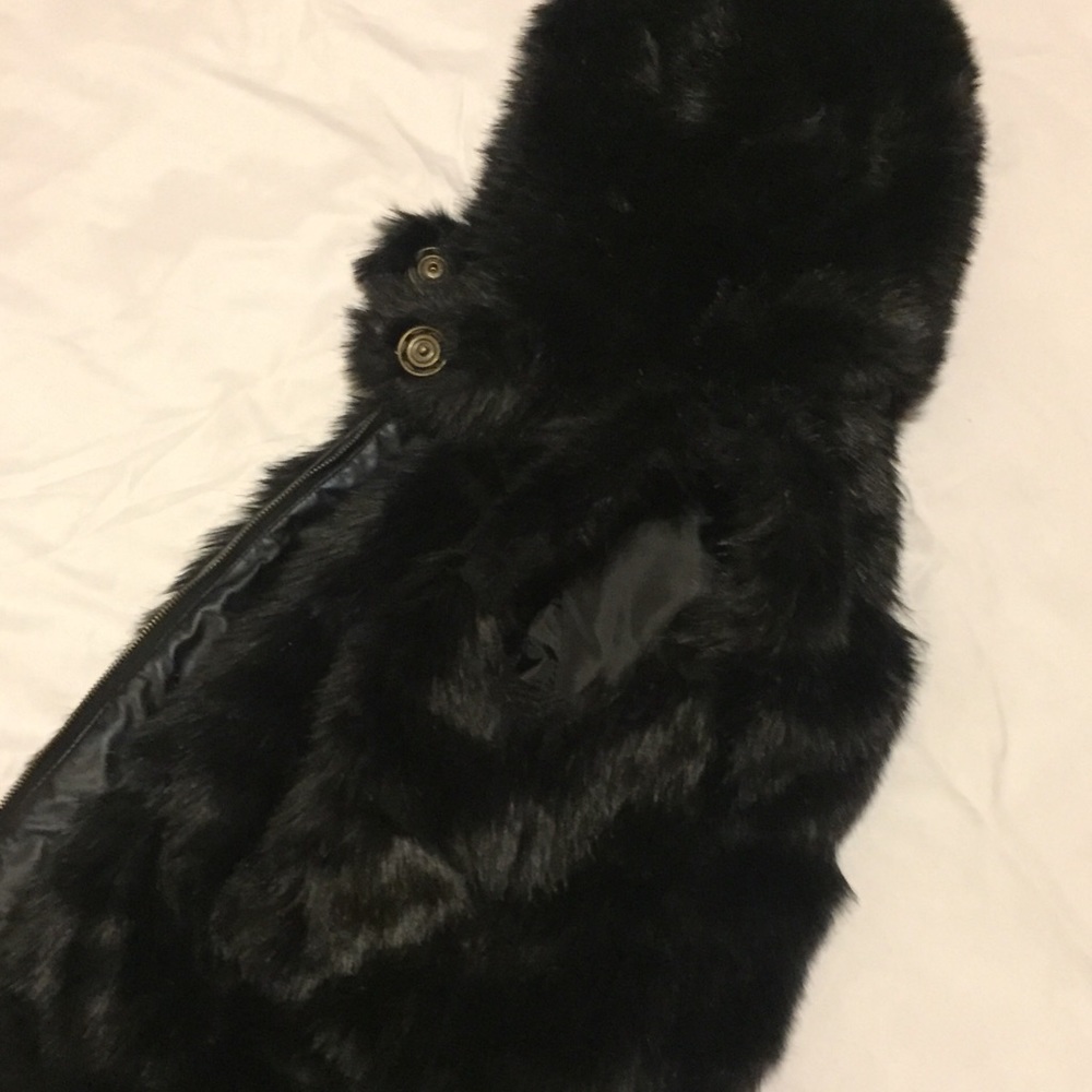 Fur winter vest with a hood