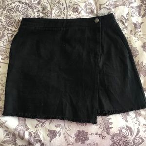 Asymmetrical black jean skirt