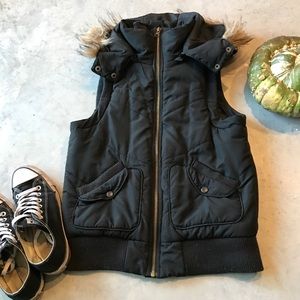 Black vest with fur hood