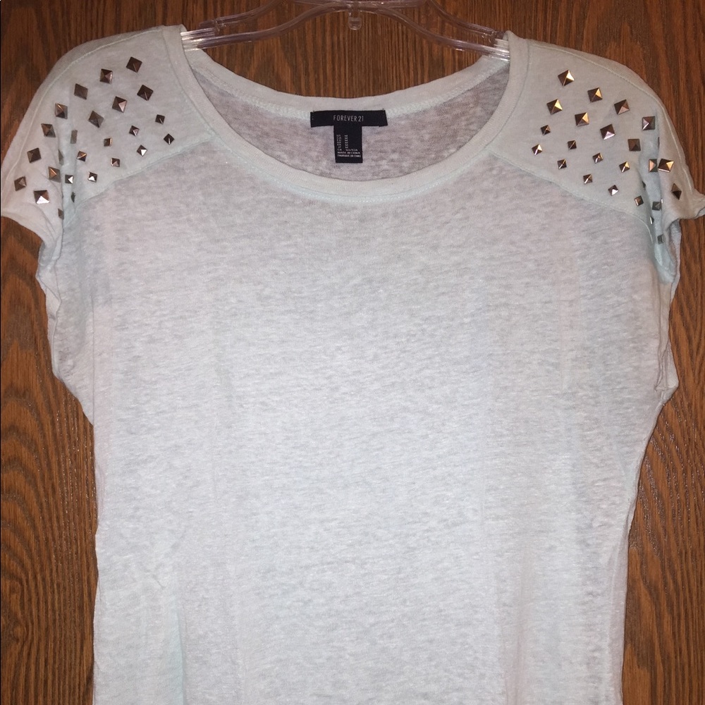Mint colored knit top with studs