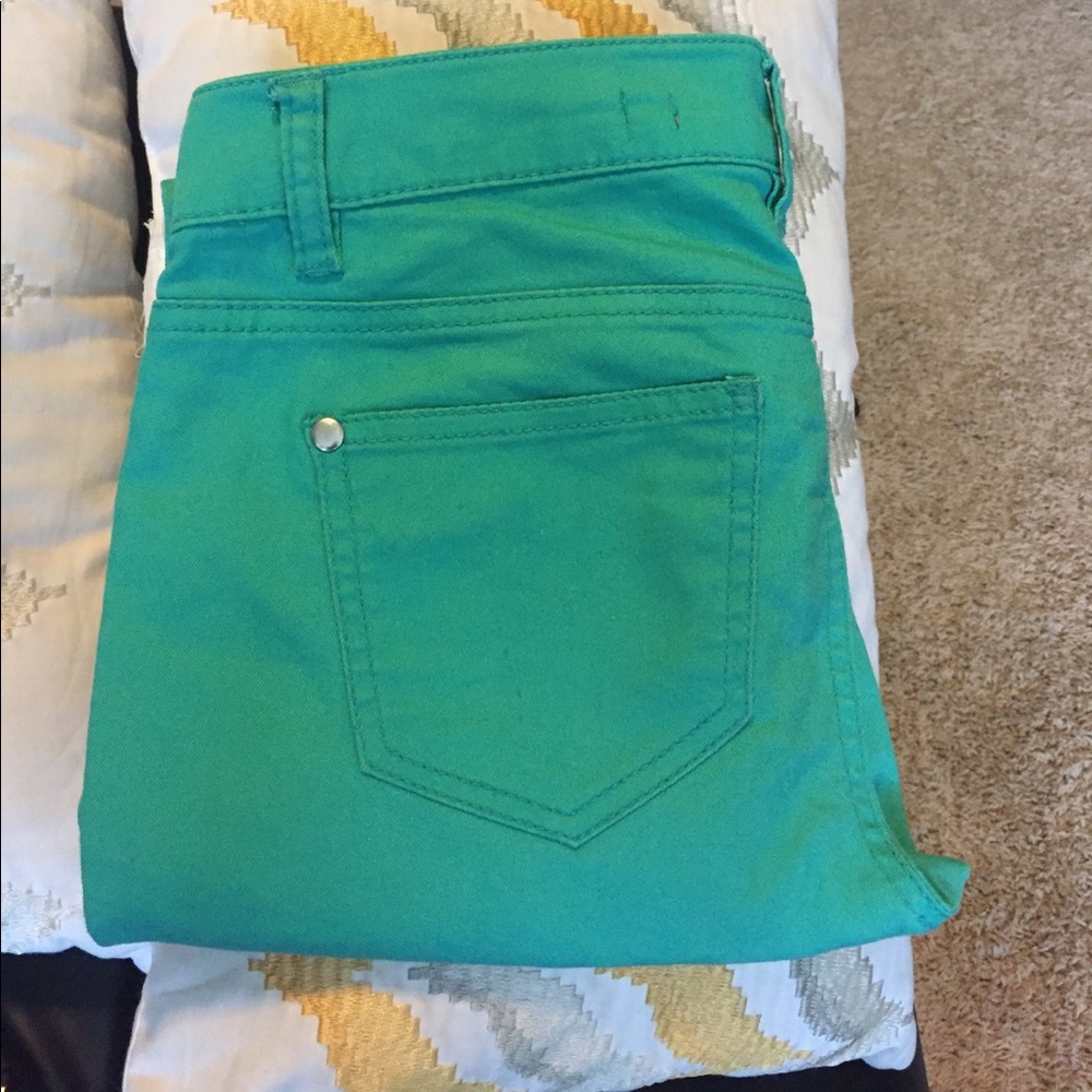 Green skinny jeans