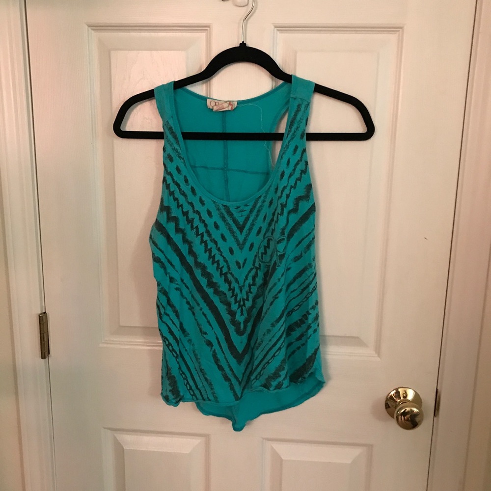 Teal tank top.