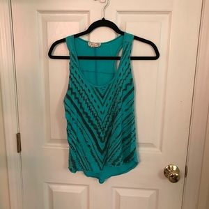 Teal tank top.