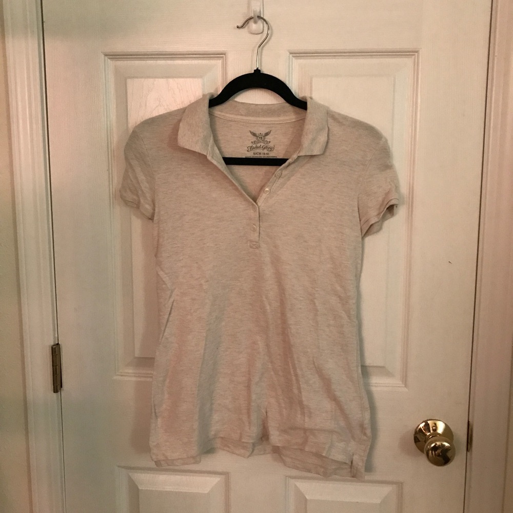 Collared short sleeve tee.