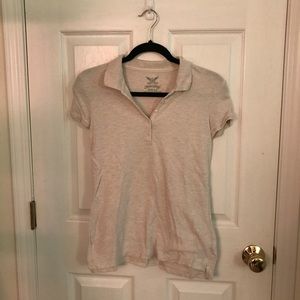 Collared short sleeve tee.