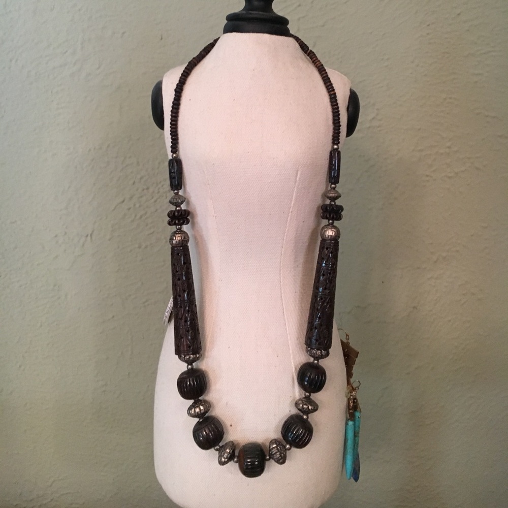 Brown and silver long beaded necklace.