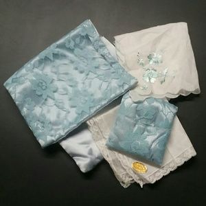 Vintage but never used ladies hankies & satin bag