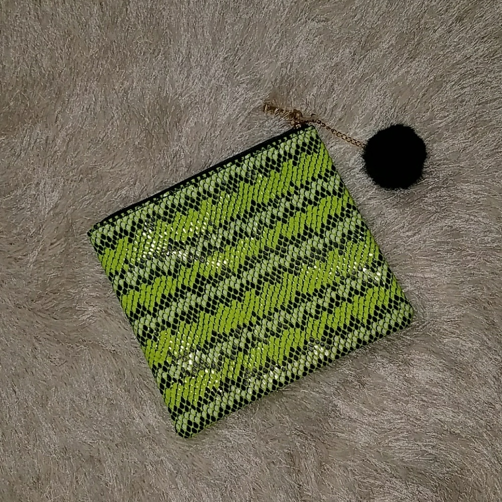 Kestrel Zipper Pom Clutch/Makeup Bag