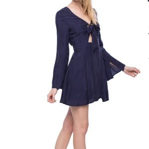 Line & Dot short dress with long sleeves.