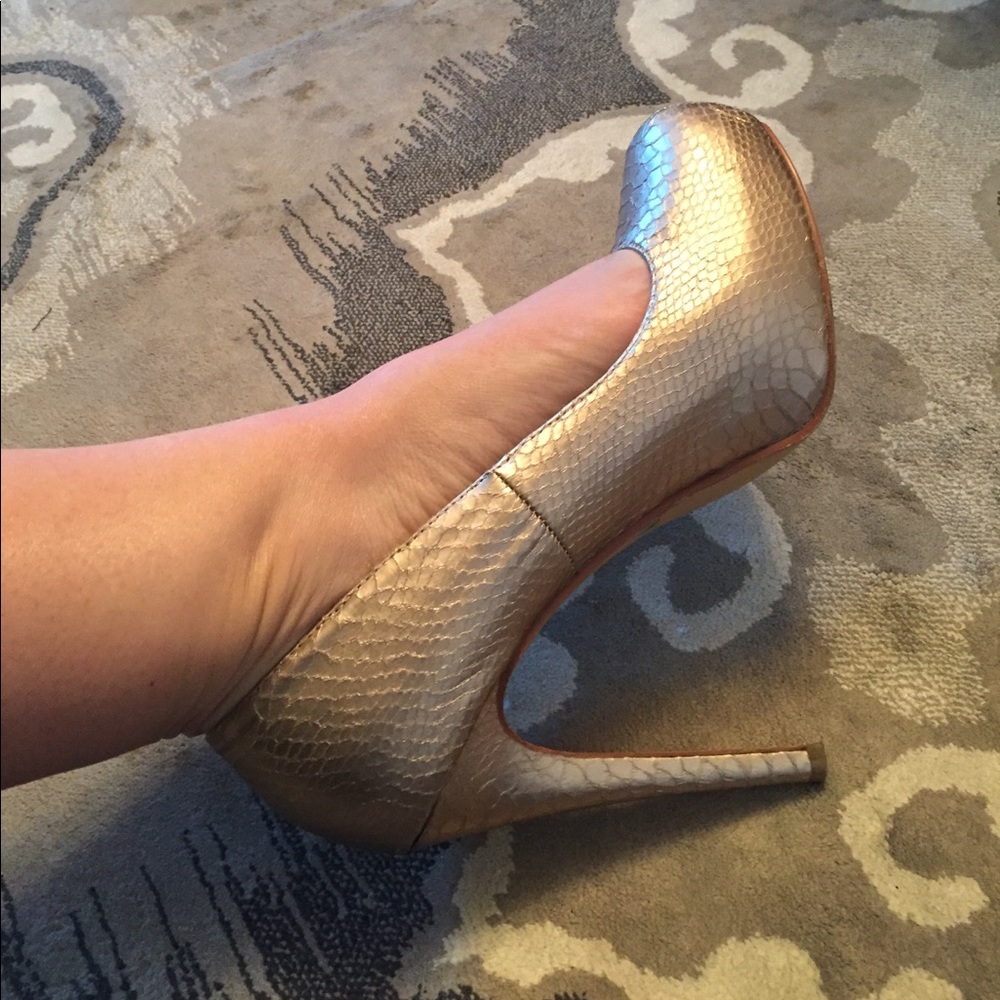 Chinese Laundry gold snake covered platform pumps.