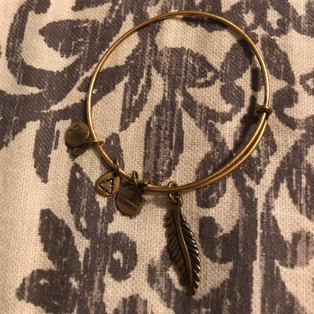 Alex and Ani Bangle with Feather charm.