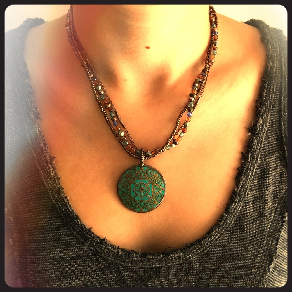 Copper-colored beaded pendant necklace