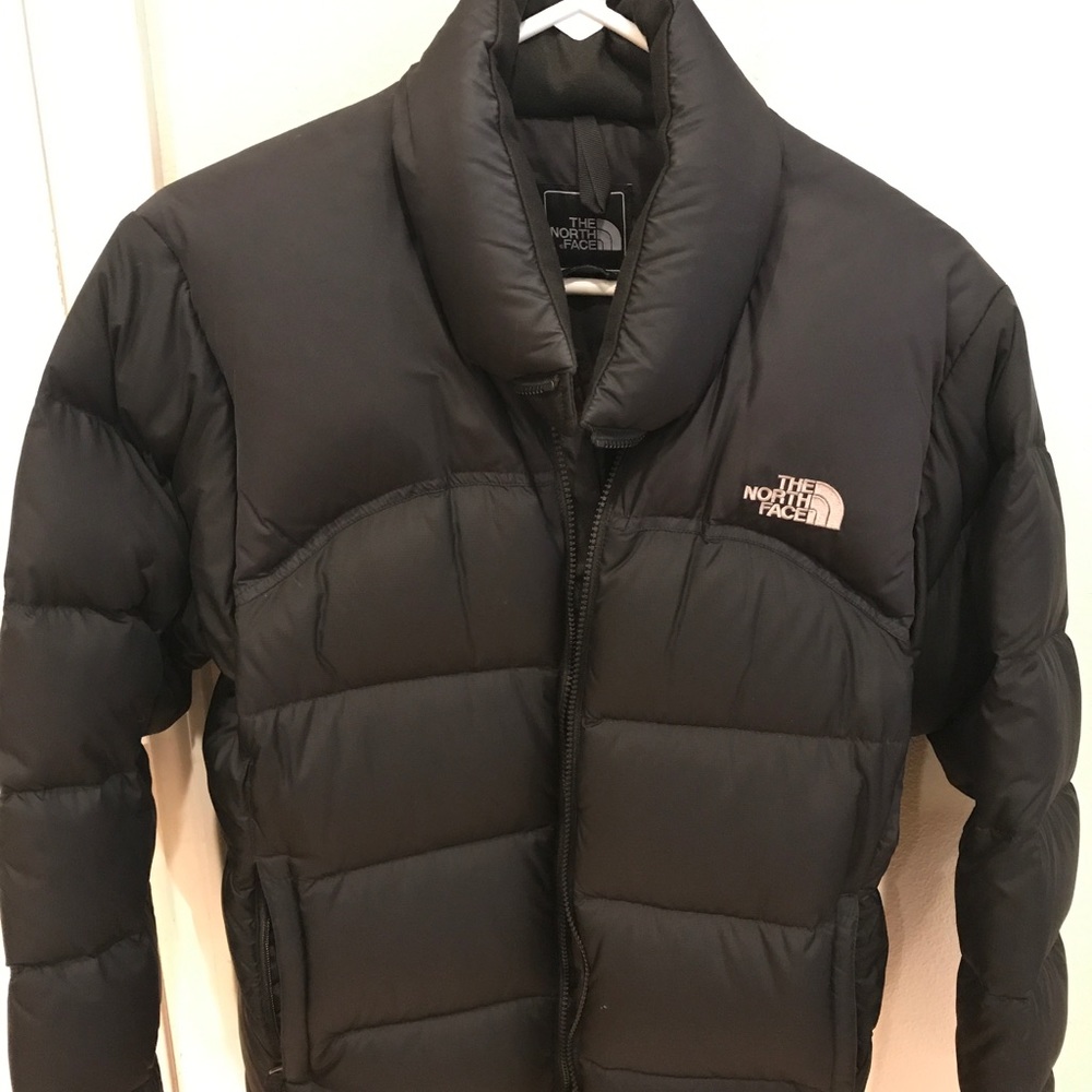 North face down jacket. Waist length.