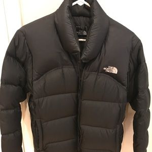 North face down jacket. Waist length.