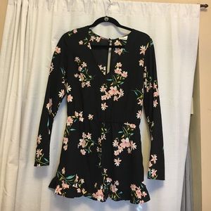 Never worn long sleeve romper, size small