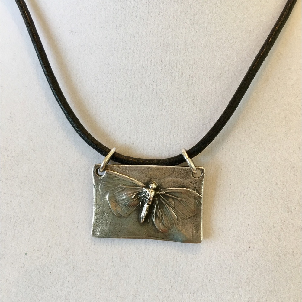 Pendant: shiny natural impression on 17.5" cord, or put on your chain, etc.