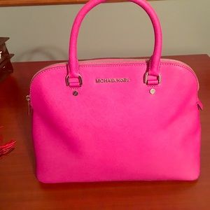 Hot pink Michael Kors small/medium sized bag.