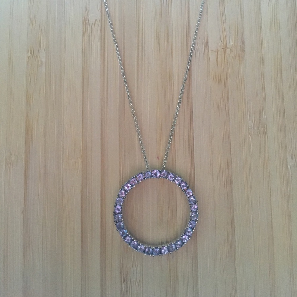 Tanzanite and white gold circle pendant
