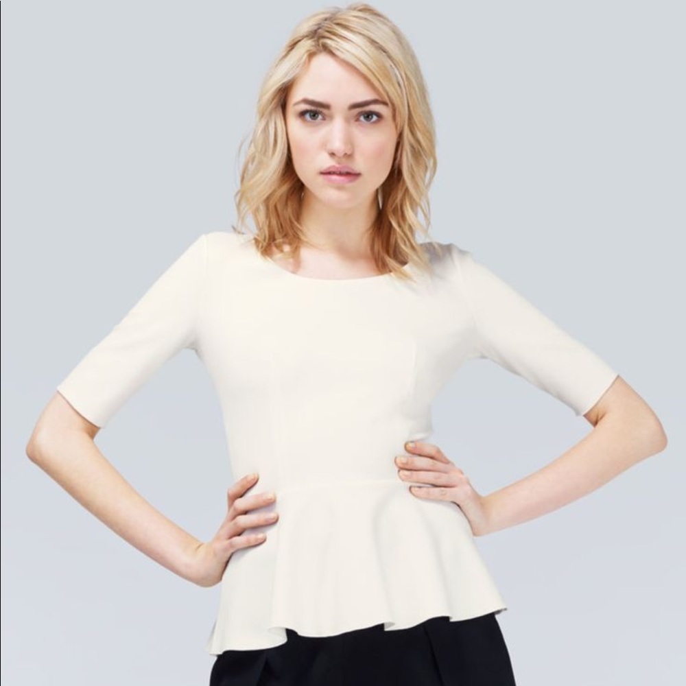 T. Babaton peplum top