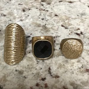 Trio golden rings with black crystal