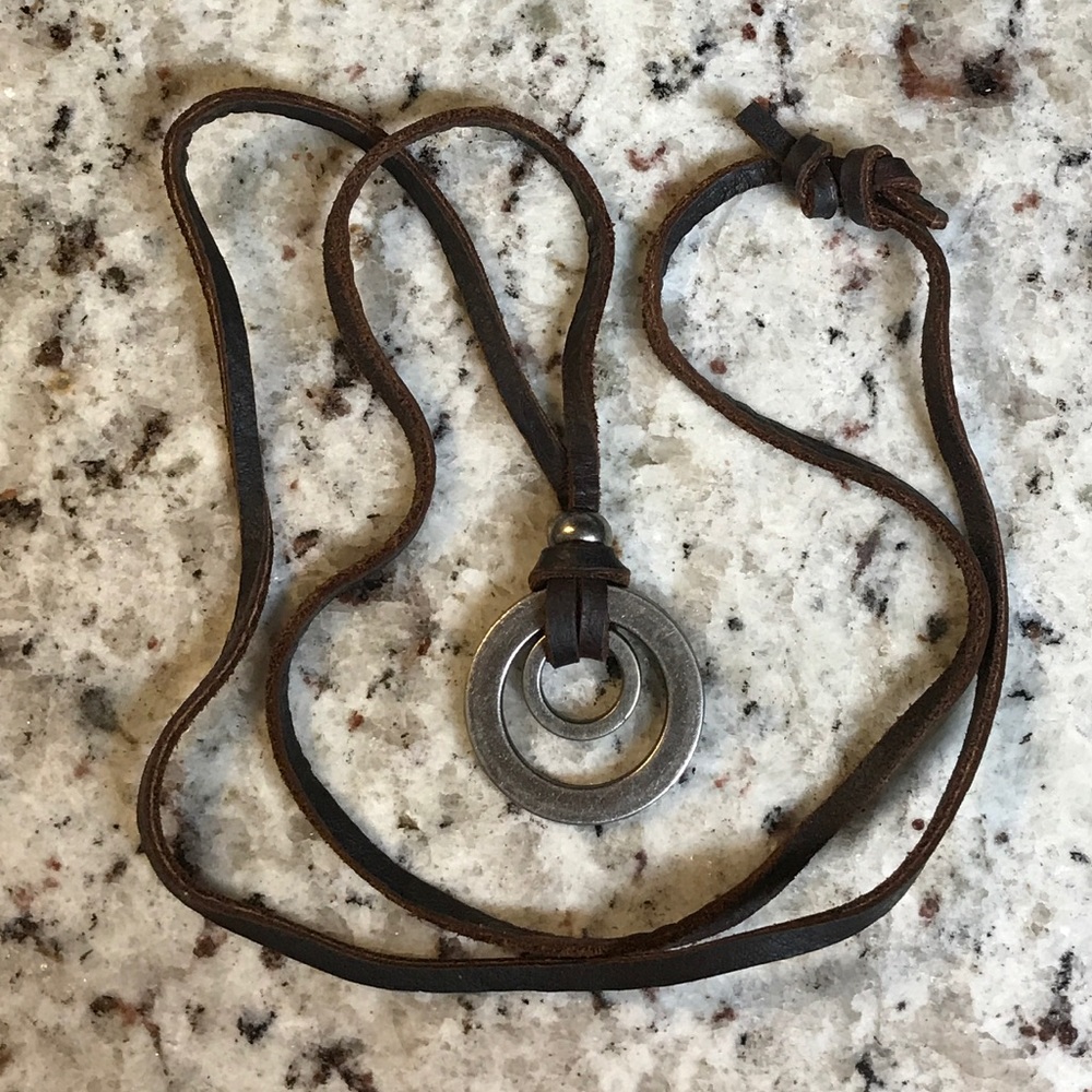 Long Leather necklace with circular silver pendant