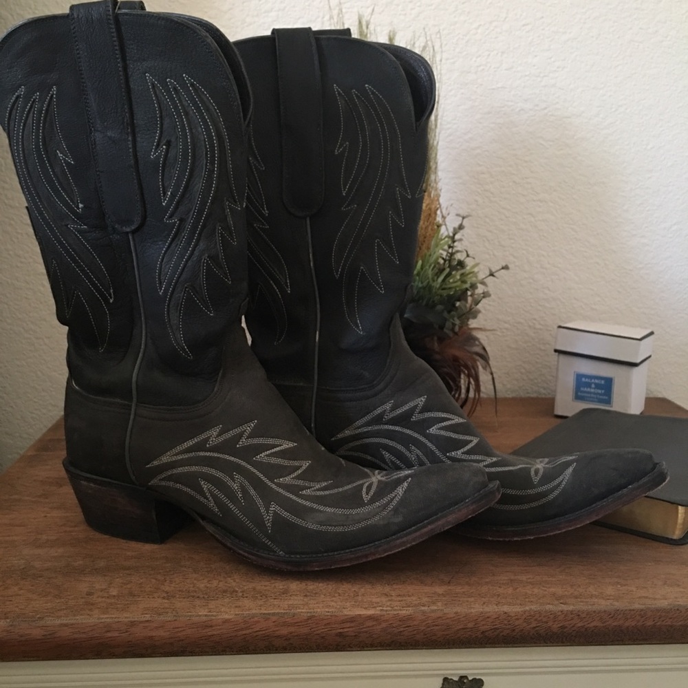 Lucchese Black cowboy boots.