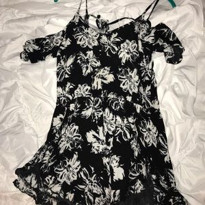 Loose shoulder floral romper