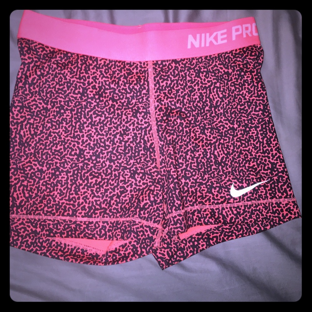 Coral Cheetah Print Nike Pros