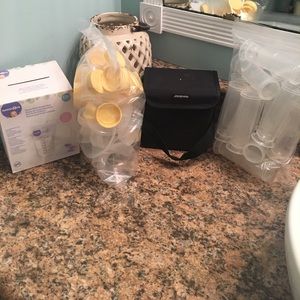 Breast pumping kit and accessories