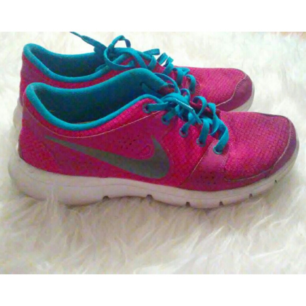 Blue and pink Nike shoes